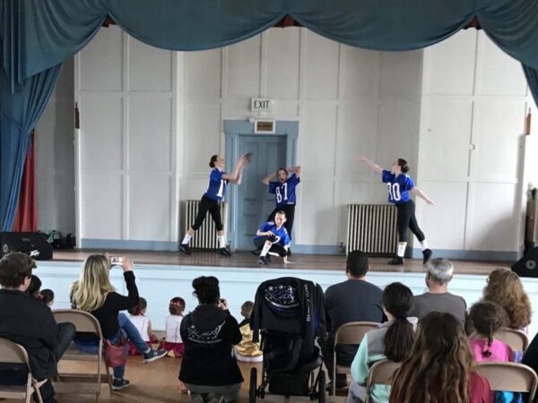 An audience watches young dancers perform on the Great Hall stage at the North Brookfield Town House during MayFest, 2019. The Architectural Heritage Foundation (AHF) is helping the Friends of the North Brookfield Town House to preserve and redevelop the historic building.